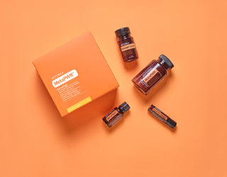 Sistema MetaPWR doTERRA en fondo naranja