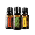 botellas de Onguard Melaleuca y limon en fondo blanco