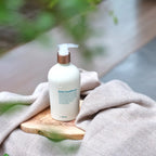 Acondicionador Diario dōTERRA 500ml — frasco blanco en estudio