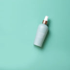 Acondicionador sin aclarado dōTERRA 237ml — frasco blanco en estudio