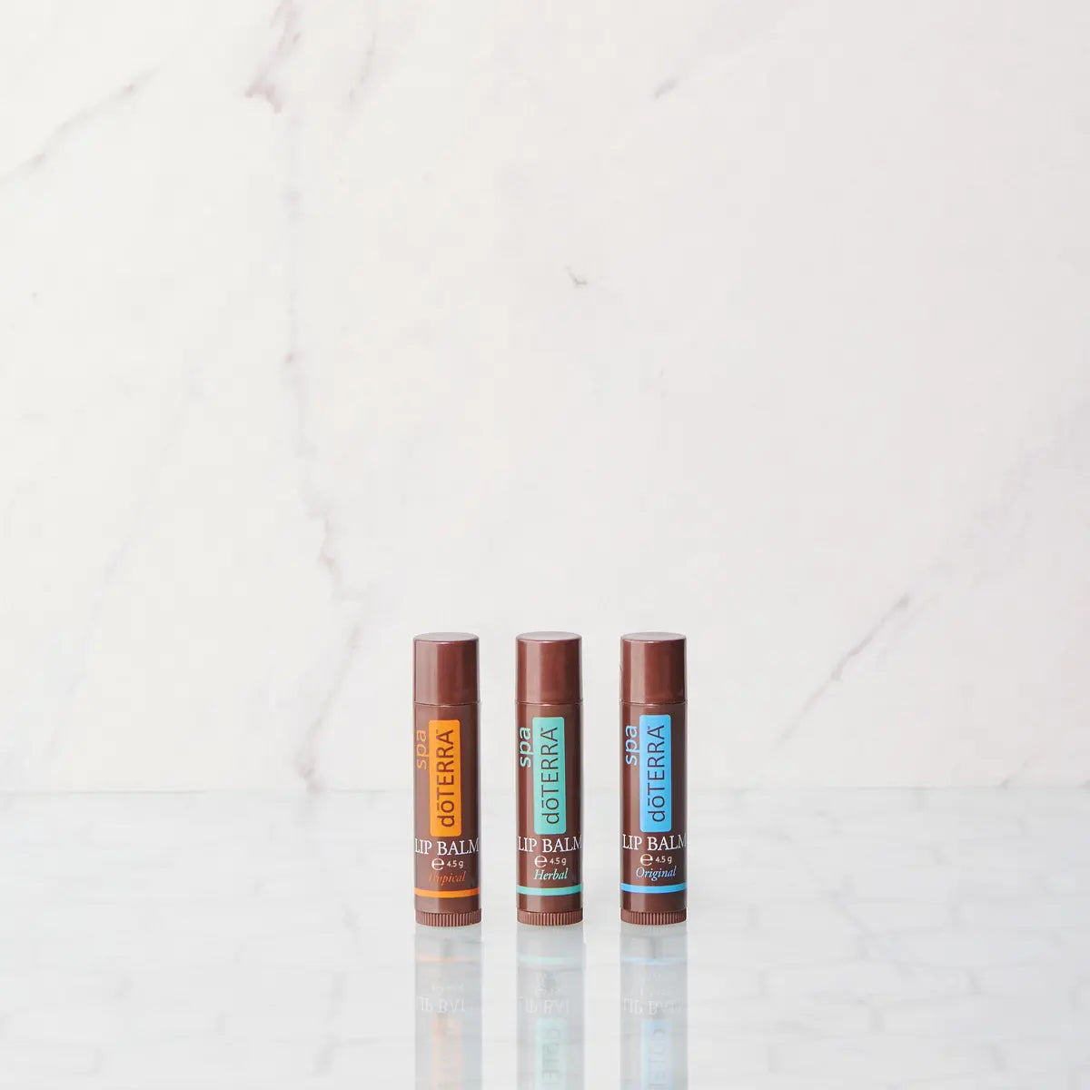 Kit Bálsamo labial SPA dōTERRA - trio de tres sabores Original, Herbal y Tropical