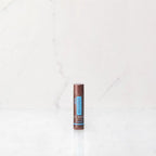 Bálsamo labial Original SPA dōTERRA versión europea sobre fondo neutro