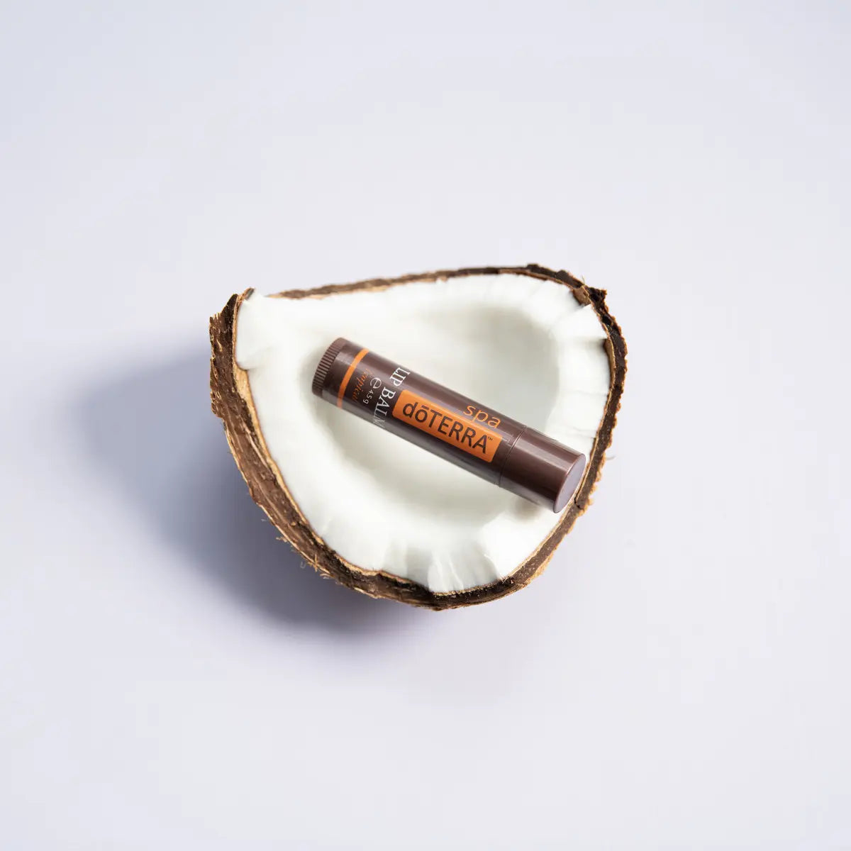 Bálsamo labial Tropical SPA dōTERRA - fotografía de estudio con acabado tropical