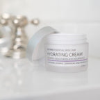 Crema hidratante dōTERRA 48g - frasco sobre fondo neutro para una piel suave e hidratada