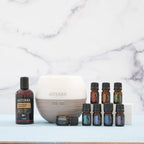 Kit AromaTouch Diffused dōTERRA con difusor y ocho aceites esenciales, coco y mármol en estudio