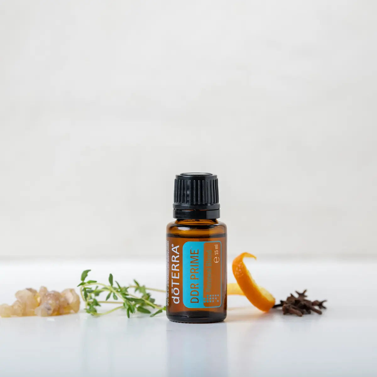 Mezcla dōTERRA DDR Prime 15ml — estudio blanco con piel de naranja, tomillo, resina e incienso