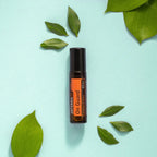 On Guard Touch Roll-On dōTERRA 10ml — con menta y eucalipto fondo blanco
