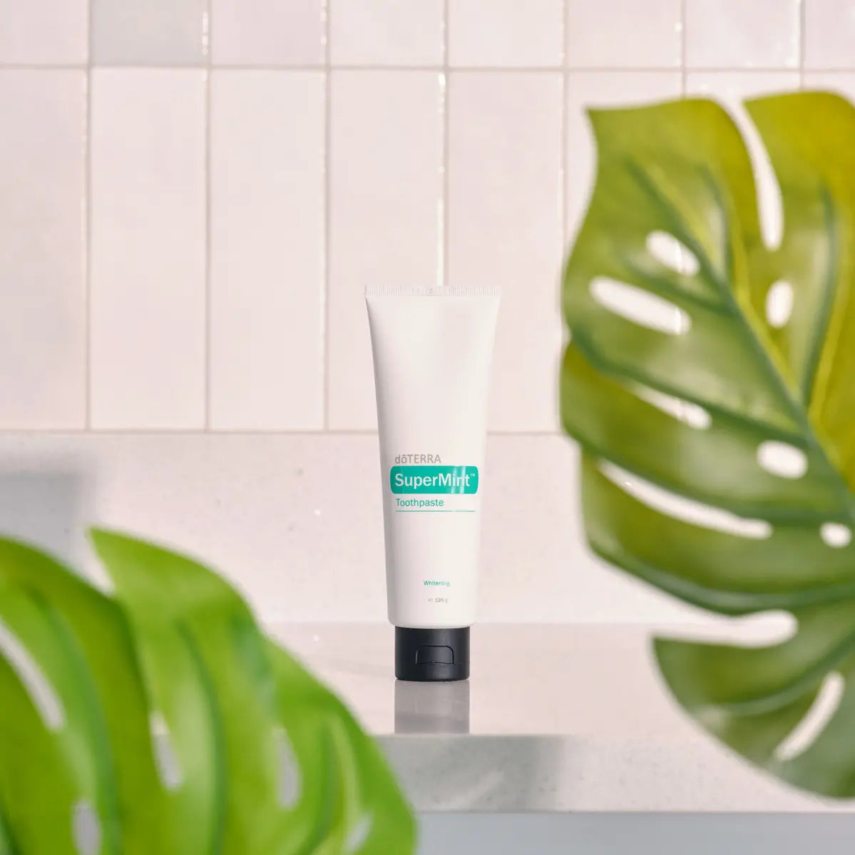 Pasta de dientes SuperMint dōTERRA 125ml — tubo con cerámica y menta fresca