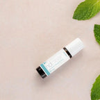 Roll-on HD Clear dōTERRA 10ml — frasco plano sobre fondo neutro