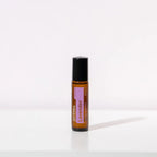 Lavanda Touch dōTERRA 10ml frasco solo sobre fondo blanco minimalista