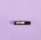 Magnolia Touch dōTERRA 10ml solo sobre fondo lila lavanda minimalista