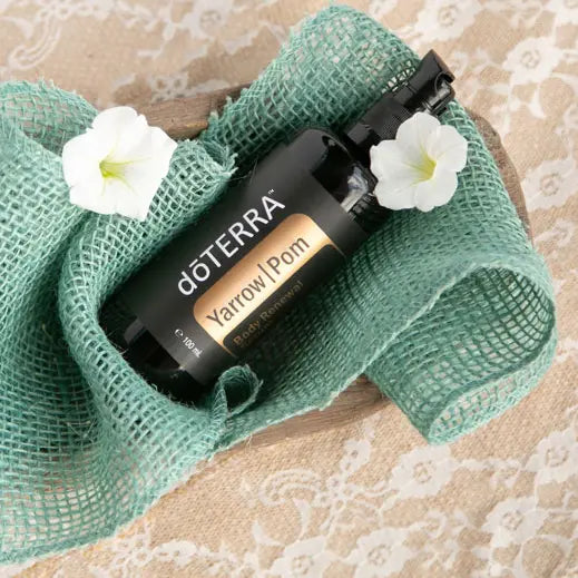 Sérum Yarrow|Pom dōTERRA 100ml — frasco dorado sobre fondo claro
