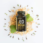 Frasco de Xeo Mega dōTERRA 120ct con botánicas, resina y menta visto desde arriba