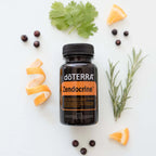 Botánicas de mandarina, enebro y romero junto a Zendocrine Softgels dōTERRA visto desde arriba