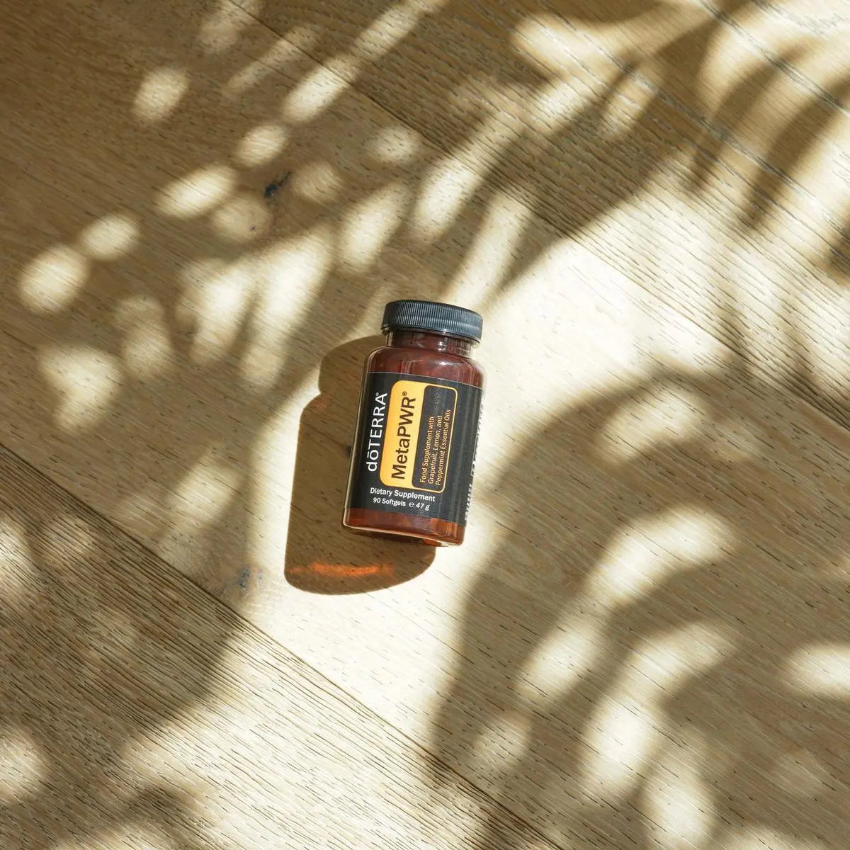 Suplementos MetaPWR™ dōTERRA — foto conjunta de softgels y beadlets