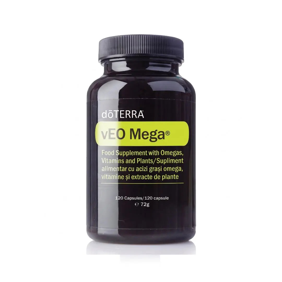 Fotografía profesional de producto e-commerce del frasco dōTERRA vEO Mega® con 120 cápsulas, sobre fondo blanco con un reflejo sutil. La etiqueta muestra detalles sobre Omegas, Vitaminas y Plantas
