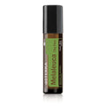 Botella Roll-on de 10 ml de Árbol de Té (Tea Tree) Touch dōTERRA con etiqueta blanca y verde, lista para aplicación tópica, sobre un fondo blanco puro.